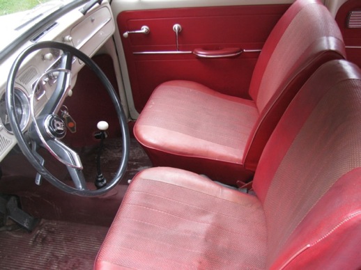 My red interior.  The dash and headliner are super.  Sunroof cranks like new.