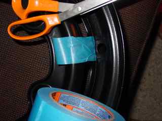 3M painters tape works well. It took a while but I found this to be the easiest way to mask the rims.